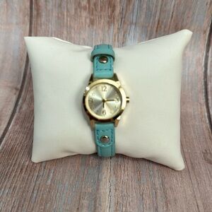 Preowned Women’s Gold and Teal Watch Item #PHK415